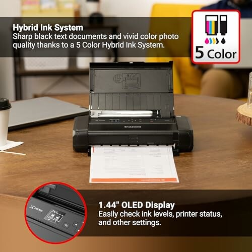 Portable printer with hybrid ink system and OLED display.